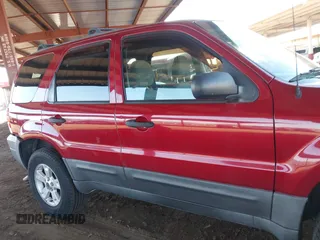 2006 Ford Escape XLT with VIN 1FMYU93126KB18365, listed as a IAAI auction lot 41889706 with 134,718 mi miles. Bid and sale history available at carsss.com. Image 13.