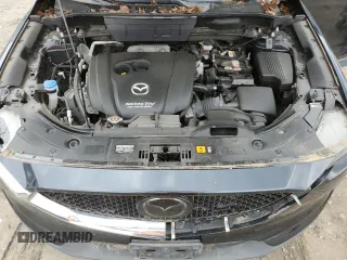2018 Mazda CX-5 Touring z VIN JM3KFBCM4J0377280, wystawiony jako Copart lot #56688575 z przebiegiem 101 167 mil mil oraz Czysty tytuł • Clean title. Historia ofert i sprzedaży dostępna na DreamBid. Obrazek 12.