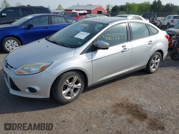 2014 Ford Focus SE with VIN 1FADP3F27EL396785, listed as a IAAI auction lot 42113377 with 147,851 mi miles. Bid and sale history available at carsss.com. Image 2.