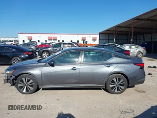 2021 Nissan Altima SV with VIN 1N4BL4DVXMN318963, listed as a IAAI auction lot 42238803 with 96,230 mi miles and . Bid and sale history available at DreamBid. Image 14.