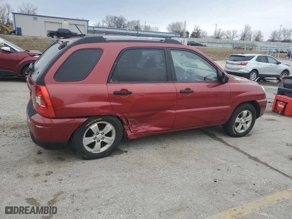 2009 Kia Sportage LX with VIN KNDJF724697600277, listed as a Copart auction lot 47852755 with 210,299 mi miles and Salvage Title. Bid and sale history available at carsss.com. Image 3.