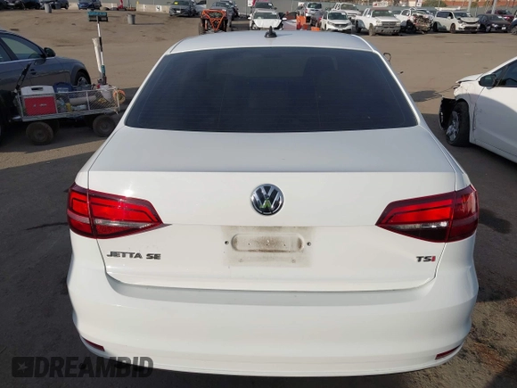 2016 Volkswagen Jetta Sedan 1.4T SE with VIN 3VWD67AJXGM365869, listed as a IAAI auction lot 41261109 with 59,325 mi miles. Bid and sale history available at carsss.com. Image 17.