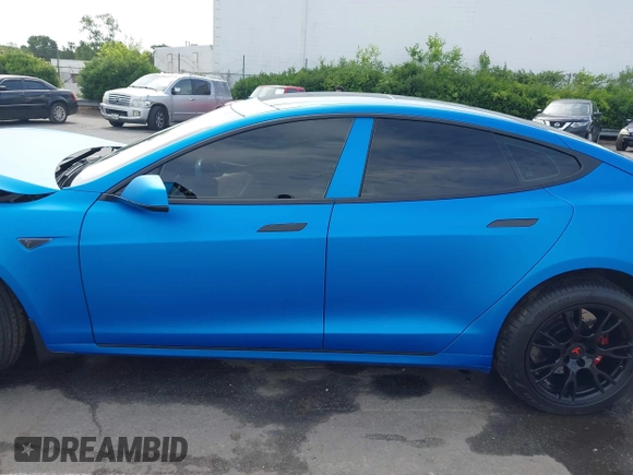 2013 Tesla Model S Performance with VIN 5YJSA1DP5DFP25345, listed as a IAAI auction lot 42288379 with 165,915 mi miles and . Bid and sale history available at DreamBid. Image 14.