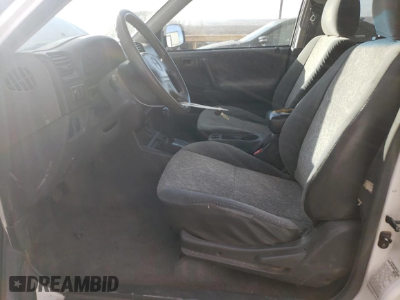 2002 Isuzu Rodeo S with VIN 4S2CK58W324314240, listed as a Copart auction lot 43694015 with 132,212 mi miles and Salvage title. Bid and sale history available at DreamBid. Image 7.