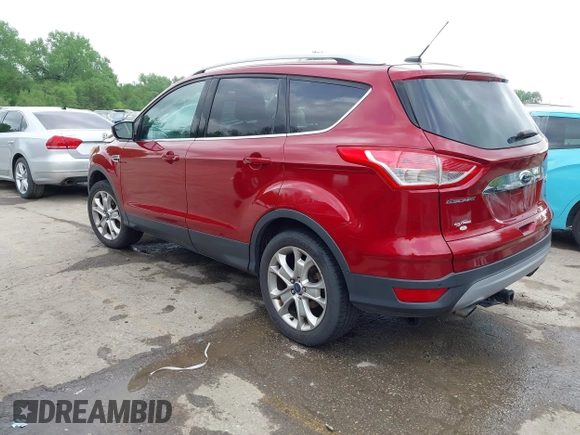2016 Ford Escape Titanium with VIN 1FMCU9JX0GUA29353, listed as a IAAI auction lot 42133326 with 143,892 mi miles and . Bid and sale history available at DreamBid. Image 3.