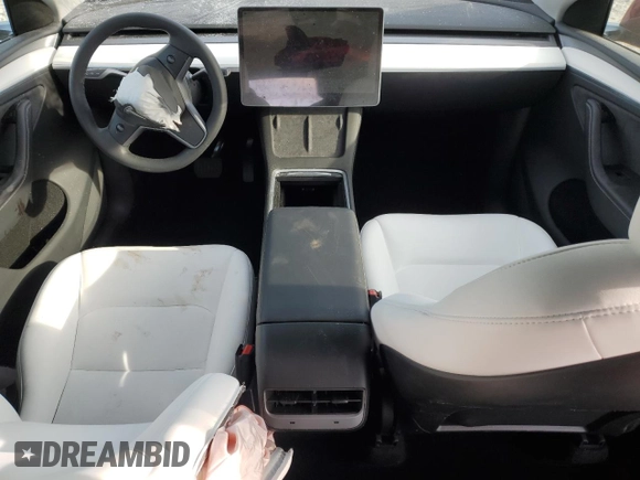2024 Tesla Model Y with VIN 7SAYGDED2RA331985, listed as a Copart auction lot 50849025 with 6,108 mi miles and Salvage title. Bid and sale history available at DreamBid. Image 8.