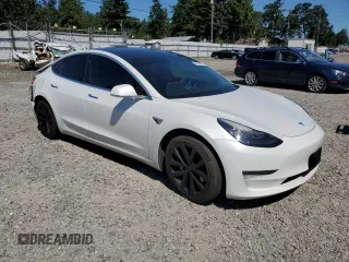 2020 Tesla Model 3 Long Range z VIN 5YJ3E1EB3LF787160, wystawiony jako Copart lot #58626965 z przebiegiem Nie podano mil oraz Szkoda całkowita • Salvage title. Historia ofert i sprzedaży dostępna na DreamBid. Obrazek 4.
