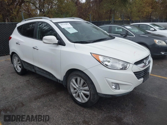 2013 Hyundai Tucson GLS with VIN KM8JU3AC4DU675511, listed as a IAAI auction lot 40765852 with 147,061 mi miles. Bid and sale history available at carsss.com. Image 1.