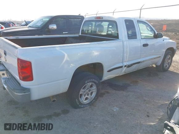 2005 Dodge Dakota SLT with VIN 1D7HE42KX5S251037, listed as a IAAI auction lot 41334761 with 202,865 mi miles and . Bid and sale history available at carsss.com. Image 4.