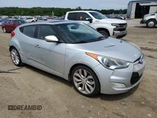 2013 Hyundai Veloster w/Gray Int z VIN KMHTC6AD3DU135296, wystawiony jako Copart lot #59778985 z przebiegiem 125 134 mil mil oraz Czysty tytuł • Clean title. Historia ofert i sprzedaży dostępna na DreamBid. Obrazek 4.
