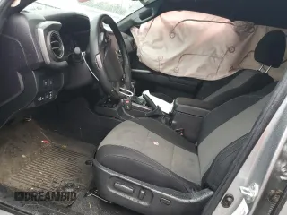 2023 Toyota Tacoma SR with VIN 3TMCZ5AN4PM566647, listed as a Copart auction lot 64062034 with 43,154 mi miles and Salvage title. Bid and sale history available at DreamBid. Image 7.