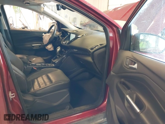 2014 Ford Escape Titanium with VIN 1FMCU0JX6EUC58726, listed as a IAAI auction lot 41656779 with 162,888 mi miles. Bid and sale history available at carsss.com. Image 5.