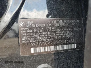 2012 BMW 7 Series 750Li xDrive with VIN WBAKC8C59CC434813, listed as a Copart auction lot 65277705 with Not provided miles and Clean title. Bid and sale history available at DreamBid. Image 12.