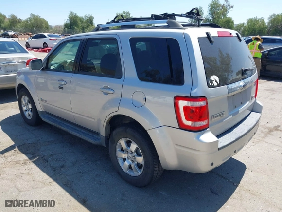 2009 Ford Escape Hybrid with VIN 1FMCU49309KC11542, listed as a IAAI auction lot 42028593 with 168,573 mi miles. Bid and sale history available at carsss.com. Image 3.