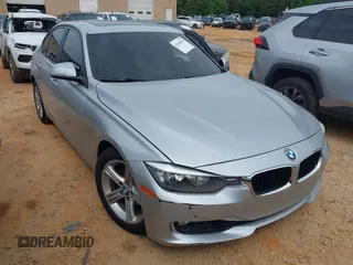 2015 BMW 3 Series 328i z VIN WBA3A5C59FP605386, wystawiony jako IAAI lot #42309429 z przebiegiem 164 463 mil mil oraz . Historia ofert i sprzedaży dostępna na DreamBid. Obrazek 1.