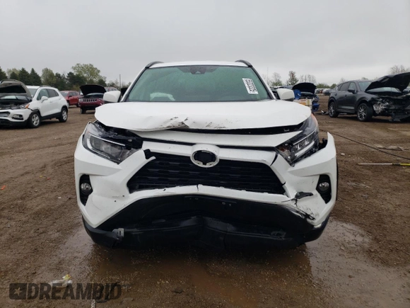 2021 Toyota RAV4 XLE with VIN 2T3P1RFV6MW228427, listed as a Copart auction lot 55323325 with 54,002 mi miles and Salvage title. Bid and sale history available at DreamBid. Image 5.