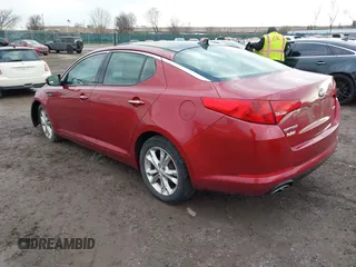 2013 Kia Optima EX z VIN 5XXGN4A78DG141924, wystawiony jako IAAI lot #41474952 z przebiegiem 172 814 mil mil oraz . Historia ofert i sprzedaży dostępna na DreamBid. Obrazek 3.