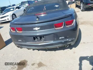 2013 Chevrolet Camaro LT z VIN 2G1FC3D33D9134173, wystawiony jako IAAI lot #41954984 z przebiegiem 157 919 mil mil oraz . Historia ofert i sprzedaży dostępna na DreamBid. Obrazek 16.