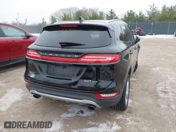 2017 Lincoln MKC Premiere with VIN 5LMCJ1D91HUL33023, listed as a IAAI auction lot 40976537 with 112,695 mi miles. Bid and sale history available at carsss.com. Image 4.