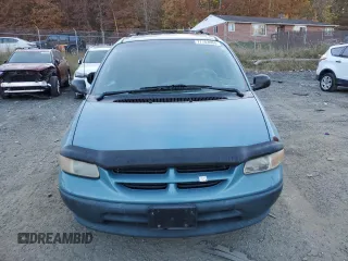 1998 Dodge Caravan with VIN 2B4FP253XWR650504, listed as a Copart auction lot 77703004 with Not Provided miles and Salvage Title. Bid and sale history available at carsss.com. Image 5.
