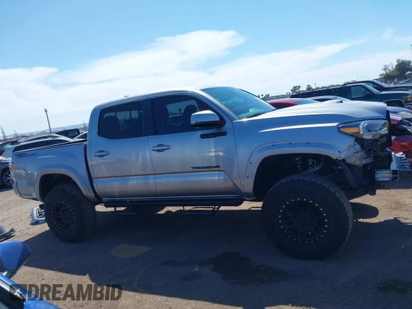2021 Toyota Tacoma SR5 with VIN 3TMAZ5CN5MM156116, listed as a IAAI auction lot 42017208 with 34,410 mi miles and . Bid and sale history available at DreamBid. Image 14.