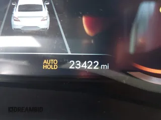 2023 Genesis G70 2.0T z VIN KMTG34TA9PU110258, wystawiony jako IAAI lot #40985797 z przebiegiem 23 422 mil mil oraz . Historia ofert i sprzedaży dostępna na DreamBid. Obrazek 7.