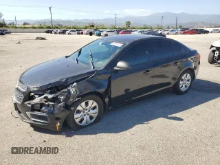 2015 Chevrolet Cruze LS with VIN 1G1PA5SGXF7186142, listed as a Copart auction lot 56368125 with 102,005 mi miles and Salvage Title. Bid and sale history available at DreamBid. Image 1.