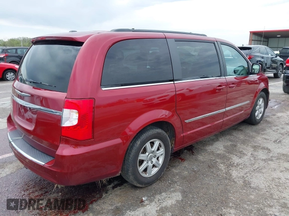 2012 Chrysler Town & Country Touring with VIN 2C4RC1BG8CR344068, listed as a IAAI auction lot 41970494 with 130,559 mi miles. Bid and sale history available at carsss.com. Image 4.