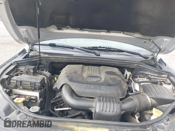 2011 Jeep Grand Cherokee Laredo with VIN 1J4RS4GGXBC564035, listed as a IAAI auction lot 41931861 with 242,291 mi miles and . Bid and sale history available at DreamBid. Image 10.