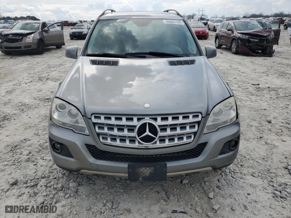 2011 Mercedes-Benz M-Class ML 350 with VIN 4JGBB8GB8BA663141, listed as a Copart auction lot 48824165 with 130,081 mi miles and Salvage Title. Bid and sale history available at carsss.com. Image 5.