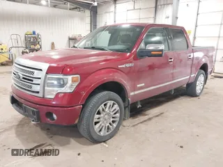 2013 Ford F-150 XL with VIN 1FTFW1ETXDFB30310, listed as a IAAI auction lot 41419674 with 122,926 mi miles. Bid and sale history available at carsss.com. Image 2.