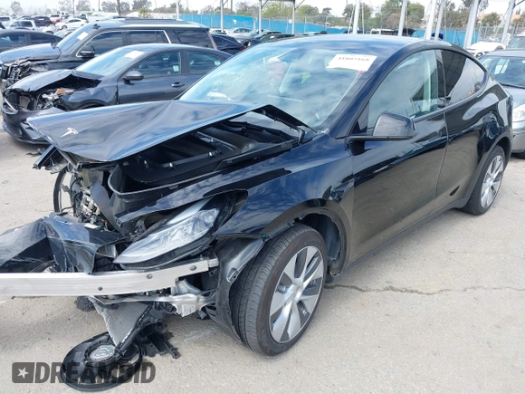 2023 Tesla Model Y Long Range z VIN 7SAYGDEE2PF863200, wystawiony jako IAAI lot #41805168 z przebiegiem 25 480 mil mil oraz . Historia ofert i sprzedaży dostępna na DreamBid. Obrazek 23.