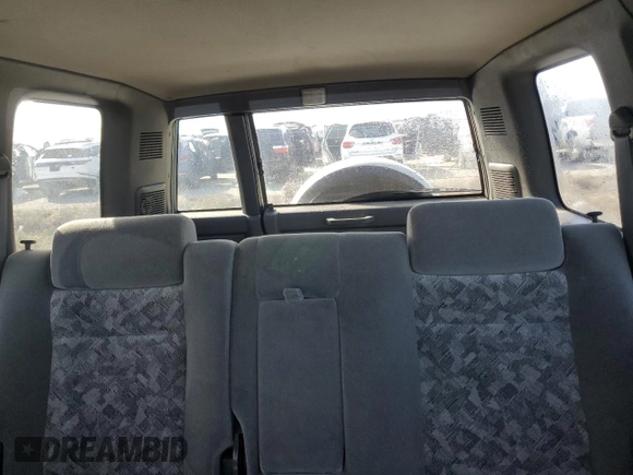 2000 Isuzu Trooper S z VIN JACDS58XXY7J11716, wystawiony jako Copart lot #76685304 z przebiegiem 92 828 mil mil oraz Nie do naprawy. Historia ofert i sprzedaży dostępna na DreamBid. Obrazek 10.