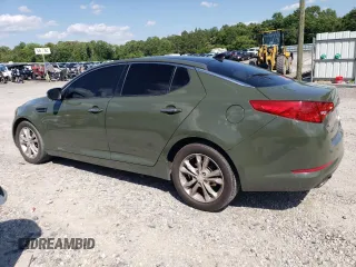 2013 Kia Optima EX с VIN 5XXGN4A77DG108218, выставлен на аукционе Copart как лот 57728815 с пробегом 162 475 миль миль и Списание • Salvage title. История ставок и продаж доступна на DreamBid. Изображение 2.