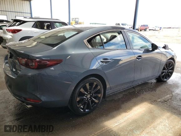 2024 Mazda 3 S Carbon Edition with VIN 3MZBPBCM3RM410653, listed as a Copart auction lot 55505645 with 26,729 mi miles and Salvage Title. Bid and sale history available at DreamBid. Image 3.