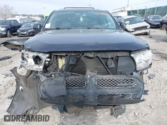 2012 Dodge Durango Crew with VIN 1C4RDJDG0CC337344, listed as a IAAI auction lot 41588370 with 162,339 mi miles. Bid and sale history available at carsss.com. Image 11.