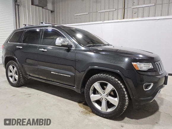 2014 Jeep Grand Cherokee Overland with VIN 1C4RJFCGXEC153250, listed as a Copart auction lot 51327195 with 132,282 mi miles and Clean Title. Bid and sale history available at DreamBid. Image 4.