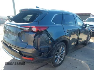 2019 Mazda CX-9 Grand Touring with VIN JM3TCADY8K0335429, listed as a IAAI auction lot 41203657 with 94,333 mi miles. Bid and sale history available at carsss.com. Image 4.