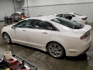 2014 Lincoln MKZ with VIN 3LN6L2JK3ER810979, listed as a Copart auction lot 50785605 with 89,141 mi miles and Salvage Title. Bid and sale history available at carsss.com. Image 2.