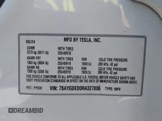 2024 Tesla Model Y with VIN 7SAYGDED0RA327806, listed as a IAAI auction lot 42096752 with 13,244 mi miles and . Bid and sale history available at DreamBid. Image 9.