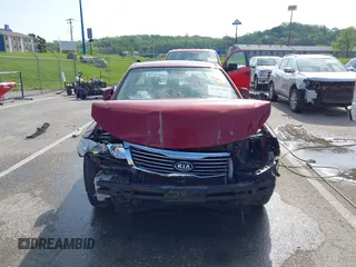 2010 Kia Optima LX z VIN KNAGG4A88A5435095, wystawiony jako IAAI lot #42085605 z przebiegiem 188 685 mil mil oraz . Historia ofert i sprzedaży dostępna na DreamBid. Obrazek 13.