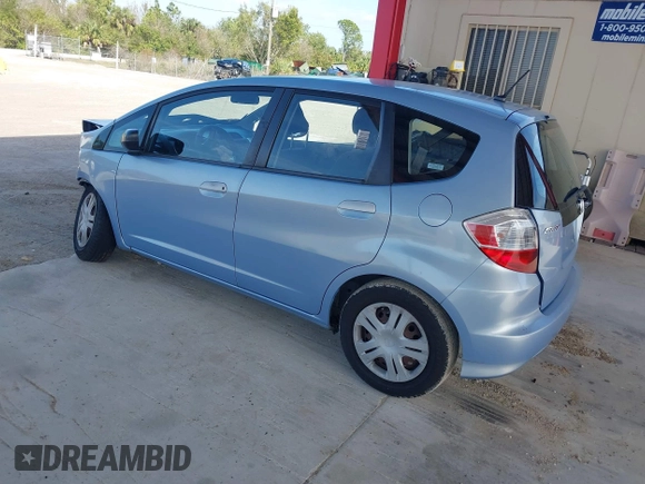 2009 Honda Fit with VIN JHMGE88289S014801, listed as a IAAI auction lot 38499131 with 140,660 mi miles and . Bid and sale history available at DreamBid. Image 3.