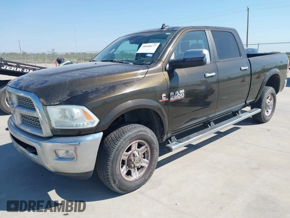 2013 Ram 2500 Laramie with VIN 3C6UR5FL7DG529590, listed as a IAAI auction lot 40608177 with 141,594 mi miles and . Bid and sale history available at DreamBid. Image 2.