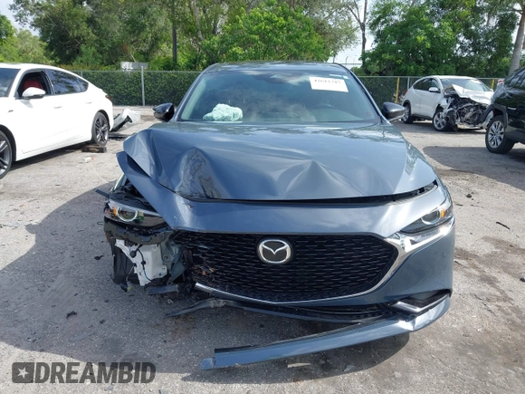 2024 Mazda 3 S Carbon Edition with VIN 3MZBPBCM2RM403824, listed as a IAAI auction lot 42612315 with 8,261 mi miles and . Bid and sale history available at DreamBid. Image 13.