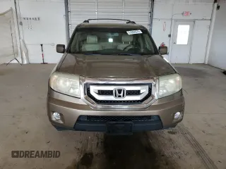 2011 Honda Pilot EX-L with VIN 5FNYF4H55BB010648, listed as a Copart auction lot 51094675 with 213,392 mi miles and Salvage Title. Bid and sale history available at DreamBid. Image 5.