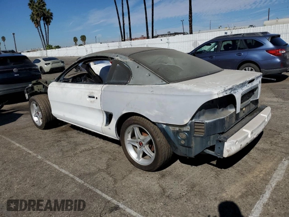 1995 Ford Mustang GT with VIN 1FALP42T7SF174211, listed as a Copart auction lot 77635124 with 158,940 mi miles and Salvage title. Bid and sale history available at DreamBid. Image 2.