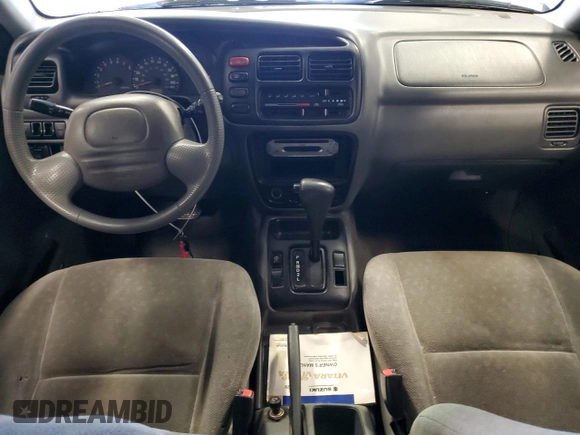 1999 Suzuki Vitara JLS z VIN 2S3TE52V6X6110719, wystawiony jako Copart lot #44219825 z przebiegiem 190 311 mil mil oraz Szkoda całkowita • Salvage title. Historia ofert i sprzedaży dostępna na DreamBid. Obrazek 8.
