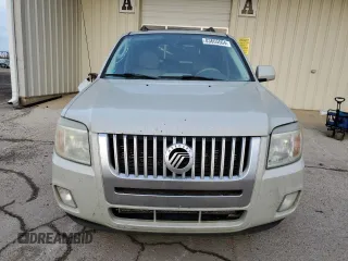 2009 Mercury Mariner Premier z VIN 4M2CU87739KJ21572, wystawiony jako Copart lot #83665504 z przebiegiem 181 858 mil mil oraz Szkoda całkowita • Salvage title. Historia ofert i sprzedaży dostępna na DreamBid. Obrazek 5.