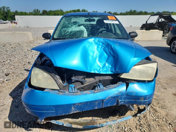 2007 Ford Focus S z VIN 1FAFP34N87W107744, wystawiony jako Copart lot #61934615 z przebiegiem Nie podano mil oraz Szkoda całkowita • Salvage title. Historia ofert i sprzedaży dostępna na DreamBid. Obrazek 5.