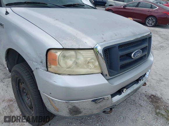 2004 Ford F-150 XL z VIN 1FTRF14504NA05239, wystawiony jako IAAI lot #41272950 z przebiegiem Nie podano mil oraz . Historia ofert i sprzedaży dostępna na DreamBid. Obrazek 16.